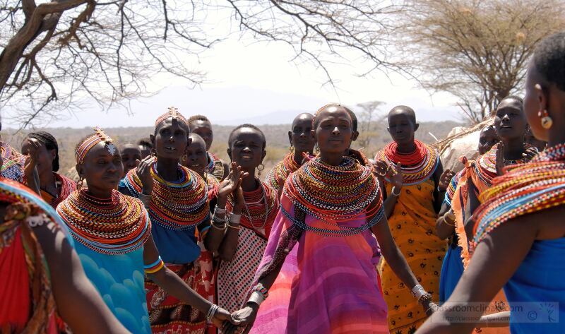 Members of the Samburu Tribe in Kenya participate in a lively cultural dance Dressed in colorful traditional attire and adorned with intricate beaded jewelry they come together under the sun to celebrate their cultural heritage and community bonds