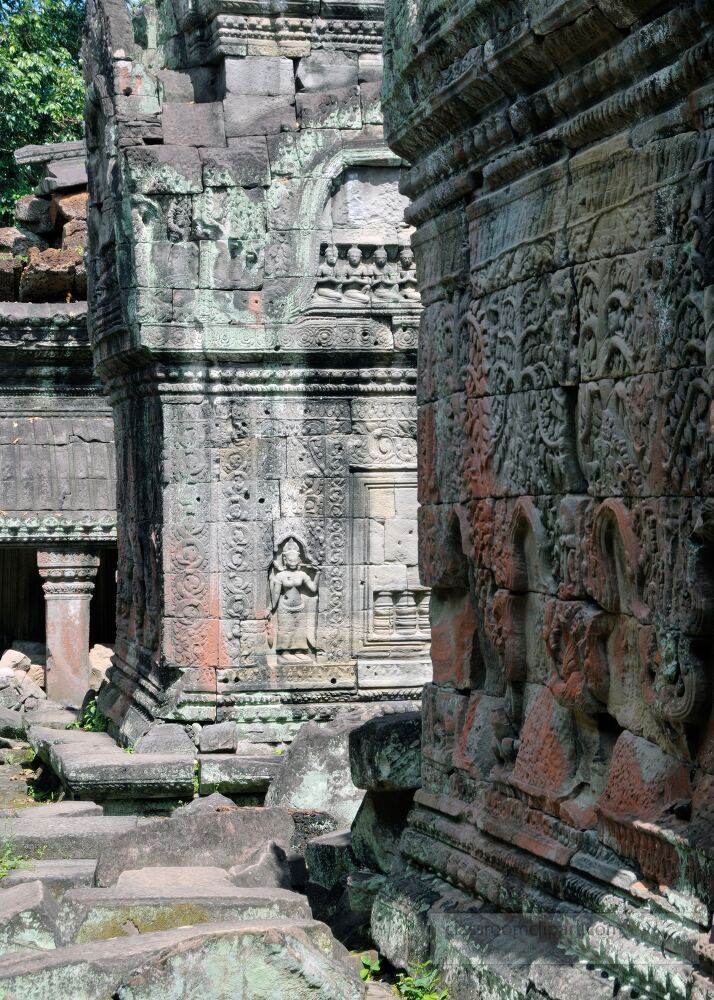 Ancient stone structures reveal stunning carvings at Angkor Wat in Siem Reap Cambodia.