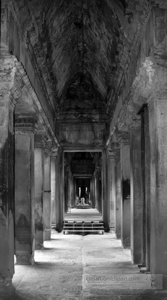 Venture into the ancient corridors of Angkor Wat where sculpted pillars and intricate architecture echo the rich history of Cambodia. Shadows play across the stones revealing the mystique of this UNESCO site at dusk.