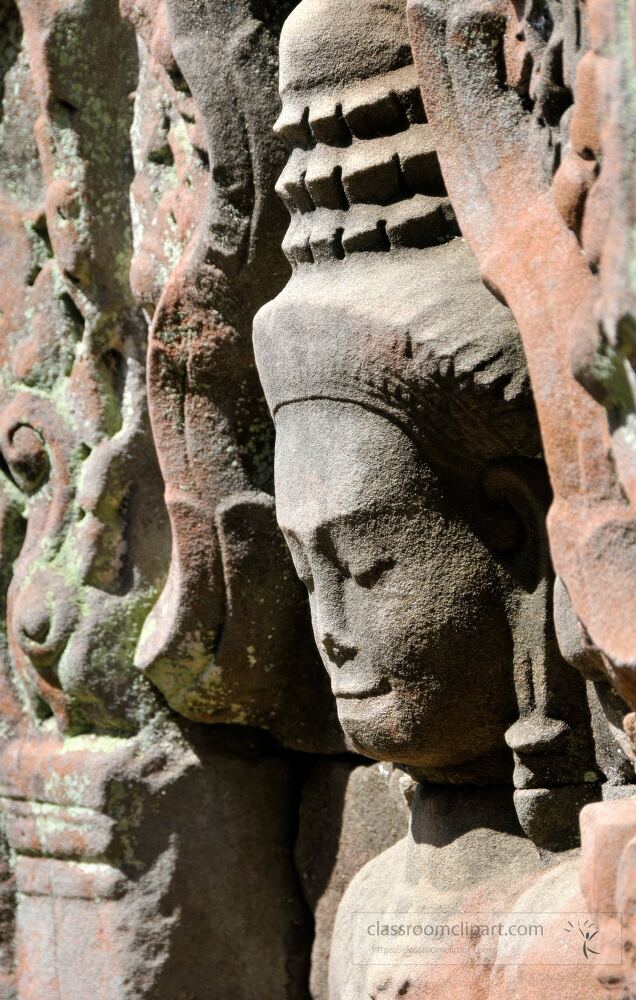 Detailed stone reliefs depicting ancient deities capture the essence of Cambodias rich heritage. The artistry showcases a serene figure amidst the grandeur of the Angkor Wat temple complex inviting exploration.