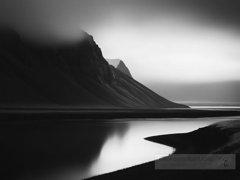 A serene Icelandic landscape unfolds, showcasing high contrast black and white tones.