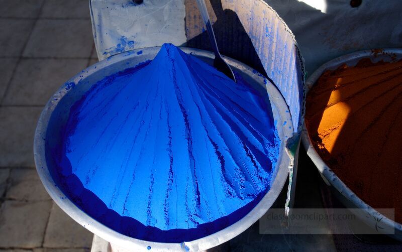 Bright blue powdered pigment is displayed in a bowl at a market in Aswan Egypt The rich color stands out in the warm sunlight showcasing local artistry and trade