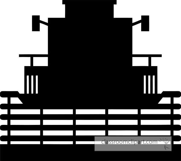 A silhouette of a large industrial machine or vehicle