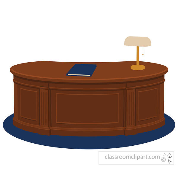 Large curved wooden desk with decorative panels a blue book and a brass desk lamp on top