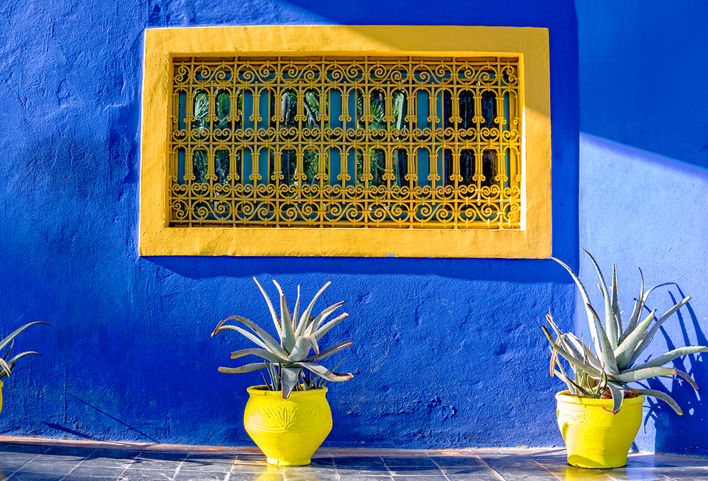 bright-blue-walls-with-yellow-window-menara-gardens-marrakeh-morocco-photo-image-6922e.jpg