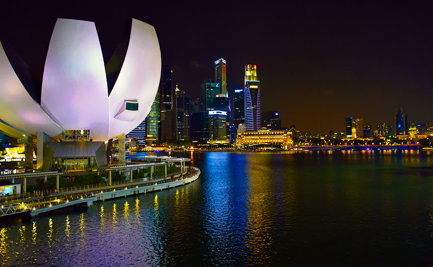 city-high-rise-building-at-night-harbor-singapore.jpg