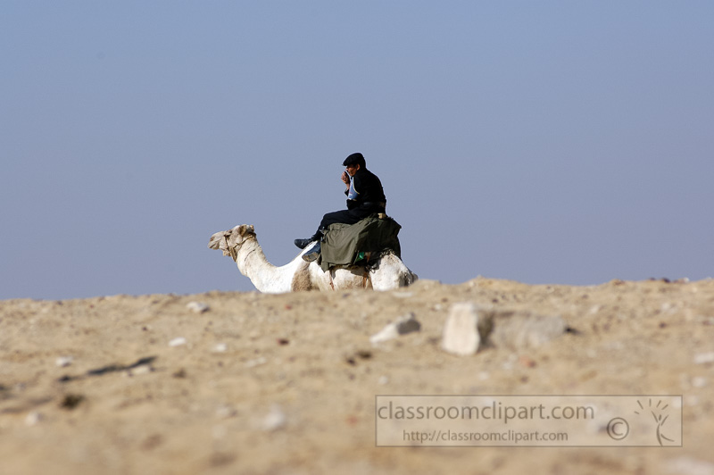 egyptain-guard-sitting-on-camel-photo-image-4937a.jpg