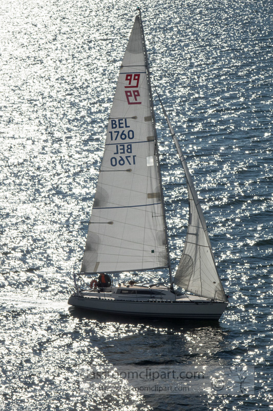 sun-hitting-sailboat-near-helsinki-finland-02714.jpg