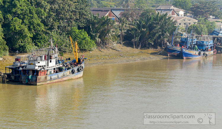 boats-docked-along-river-banks-myanmar-6517A.jpg