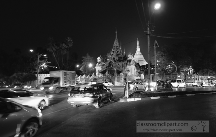 stupa-of-temple-car-traffic-at-night-yangon-in-myanmar-6400.jpg