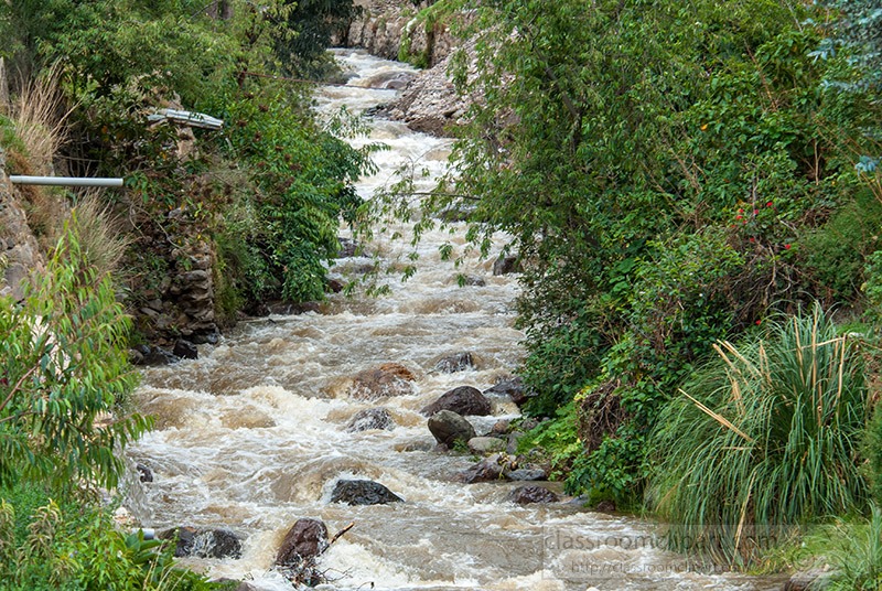 flowing-river-along-mountains-in-peru.jpg