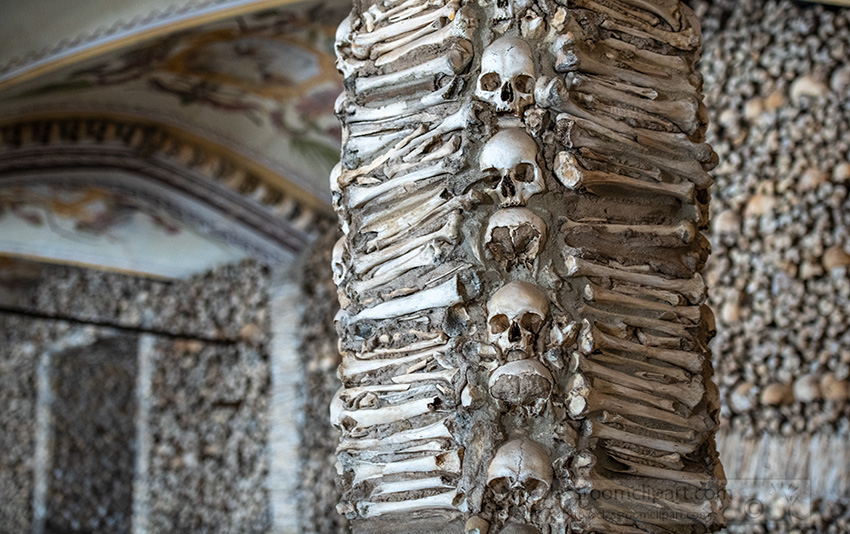column-with-skulls-at-chapel-of-bones-evora-portugal.jpg