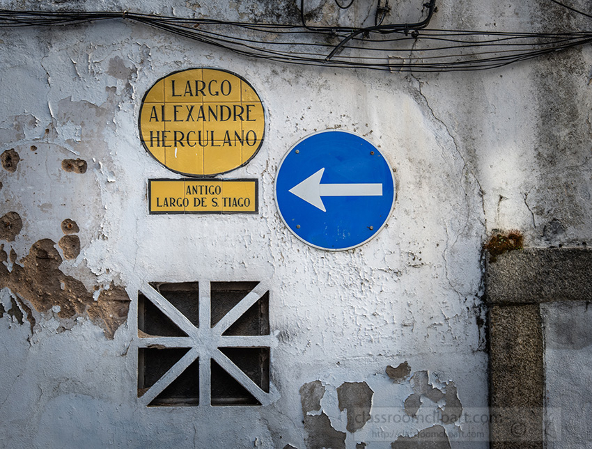 road-signs-on-a-weathered-wall-in-lisbon.jpg