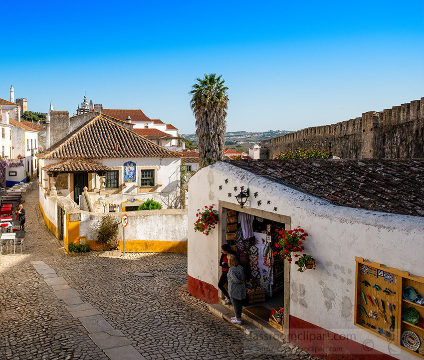 white-washed-building-cobble-stone-street-obidos-portugal_8504030-edit.jpg