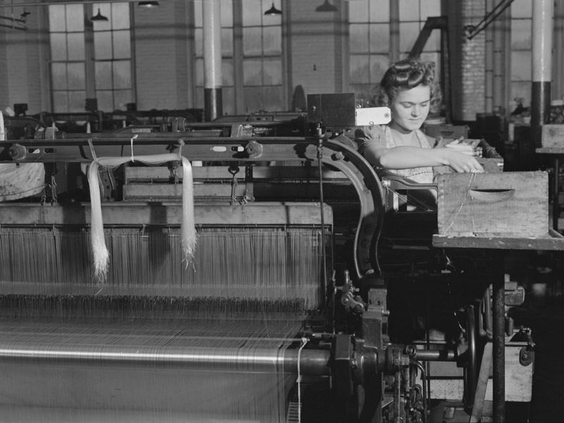 at-a-loom-in-the-denomah-mills-taftville-connecticut.jpg