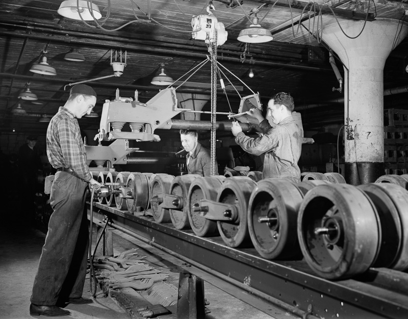 bogy-assembly-for-an-army-halftrac-scout-car-takes-shape-on-the-production-line-of-an-ohio-truck-plant.jpg