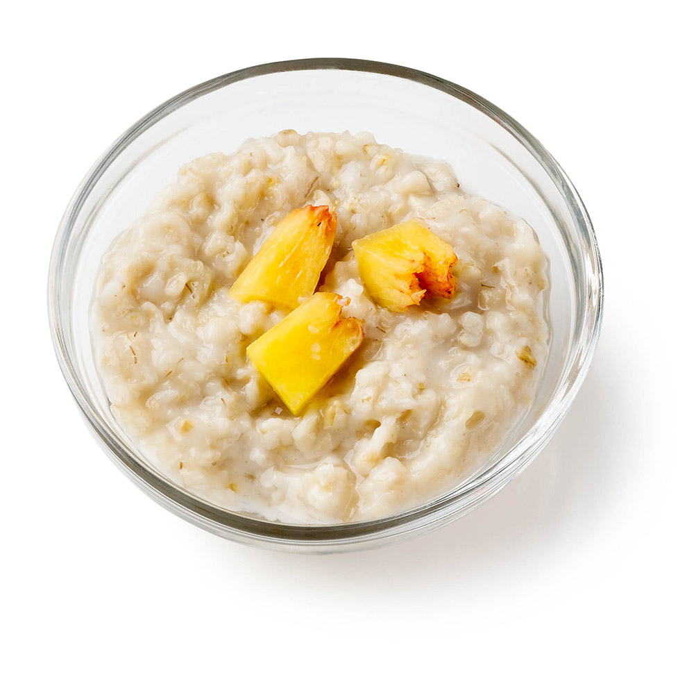 cooked-oatmeal-topped-with-three-peaches.jpg