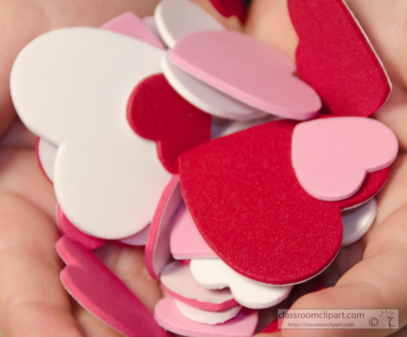 hand_holding_paper_hearts__picture-image3925a.jpg