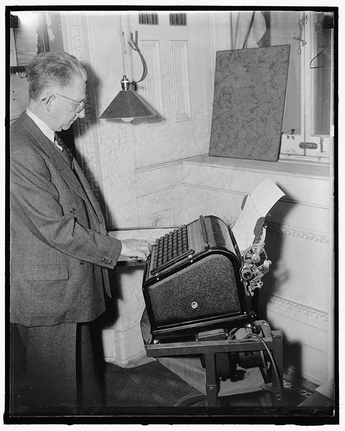 new-time-saving-voting-machine-designed-to-capitol-employee.-washington-d.c.-may-10-1938.jpg
