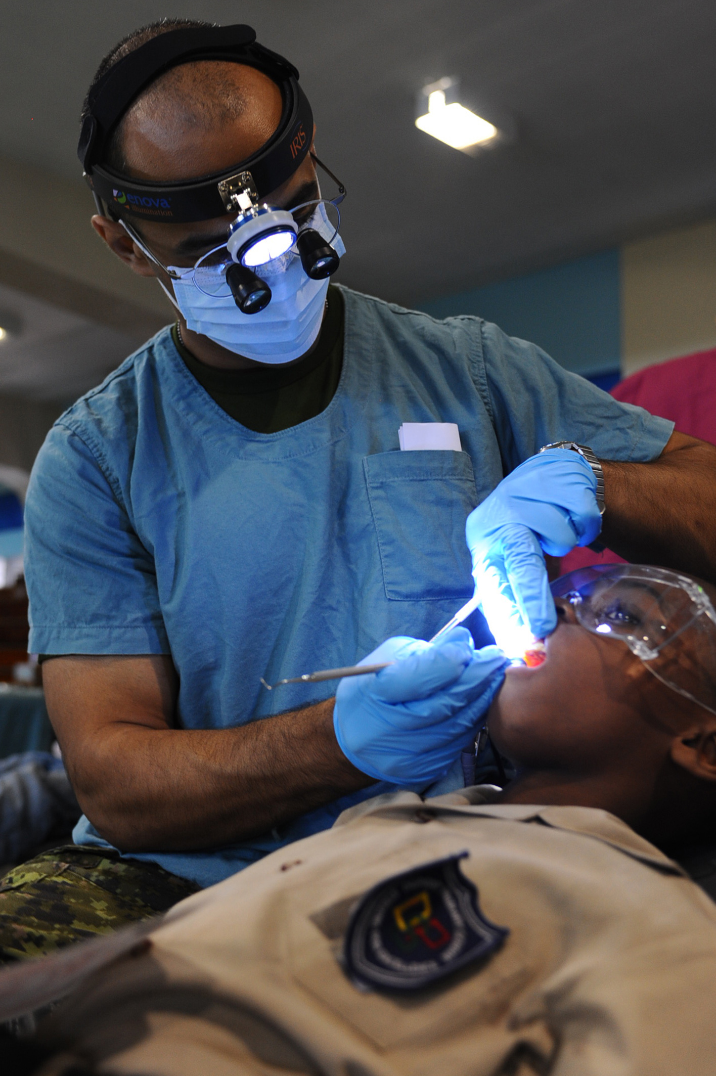 dentist-performs-exam-on-patient.jpg