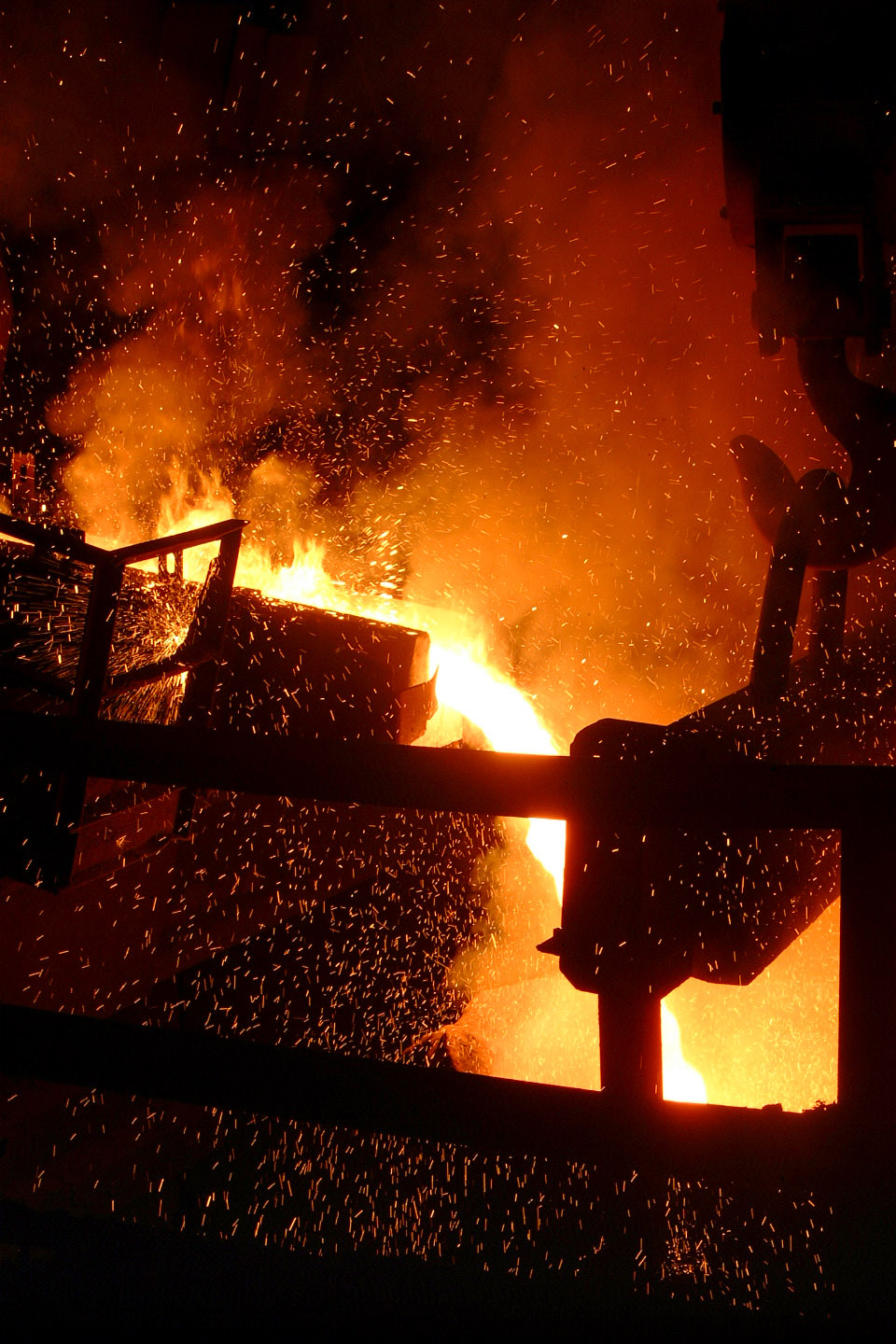 molten-steel-poured-into-kettle-at-foundry.jpg