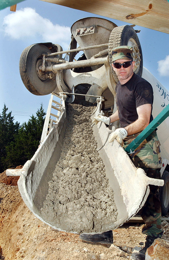 pouring-of-concrete-to-protect-an-electrical-conduit.jpg