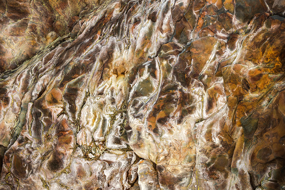 swirling-pattern-of-rocks-closeup.jpg