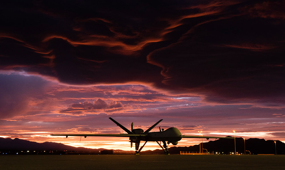 mq-9-reaper-sits-on-the-flightline-as-the-sun-sets.jpg