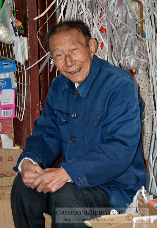 smiling-old-man-sitting-outside-food-stall-shanghai-chian-photo-image-01.jpg