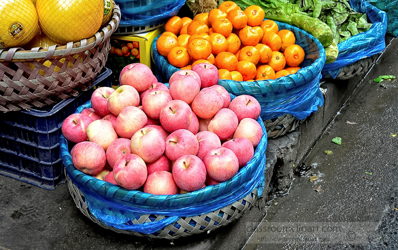 wicker-baskets-of-apples-and-oranges-photo-image-11.jpg