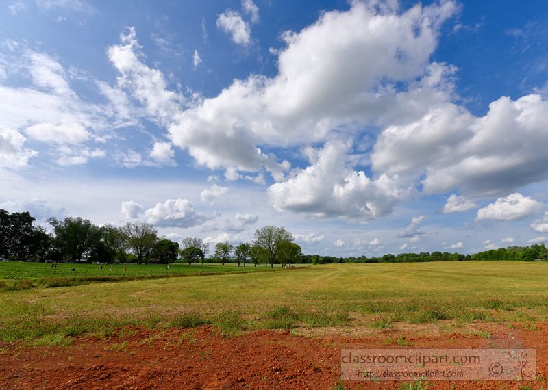 cummulus-clouds-over-agricultural-land-photo-image-1494A.jpg