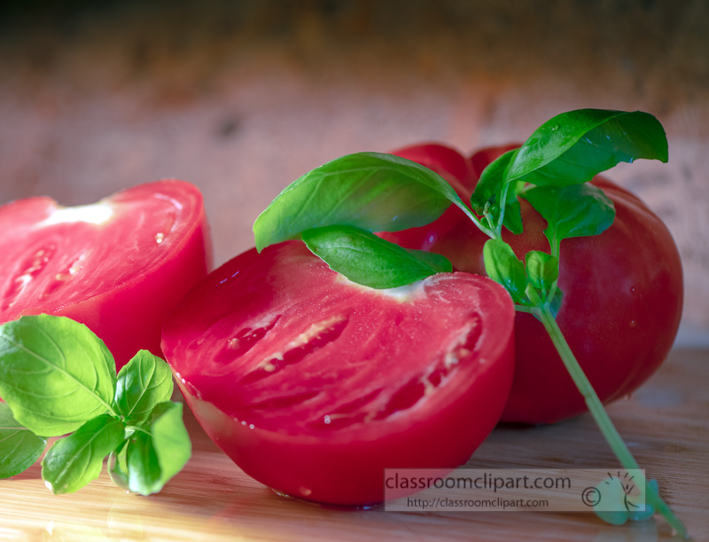 fresh-sliced-tomatoes-with-basil-leaves-8500338.jpg