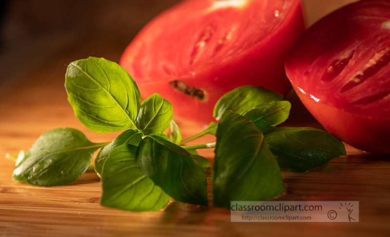 fresh-sliced-tomatoes-with-basil-leaves-8500341.jpg