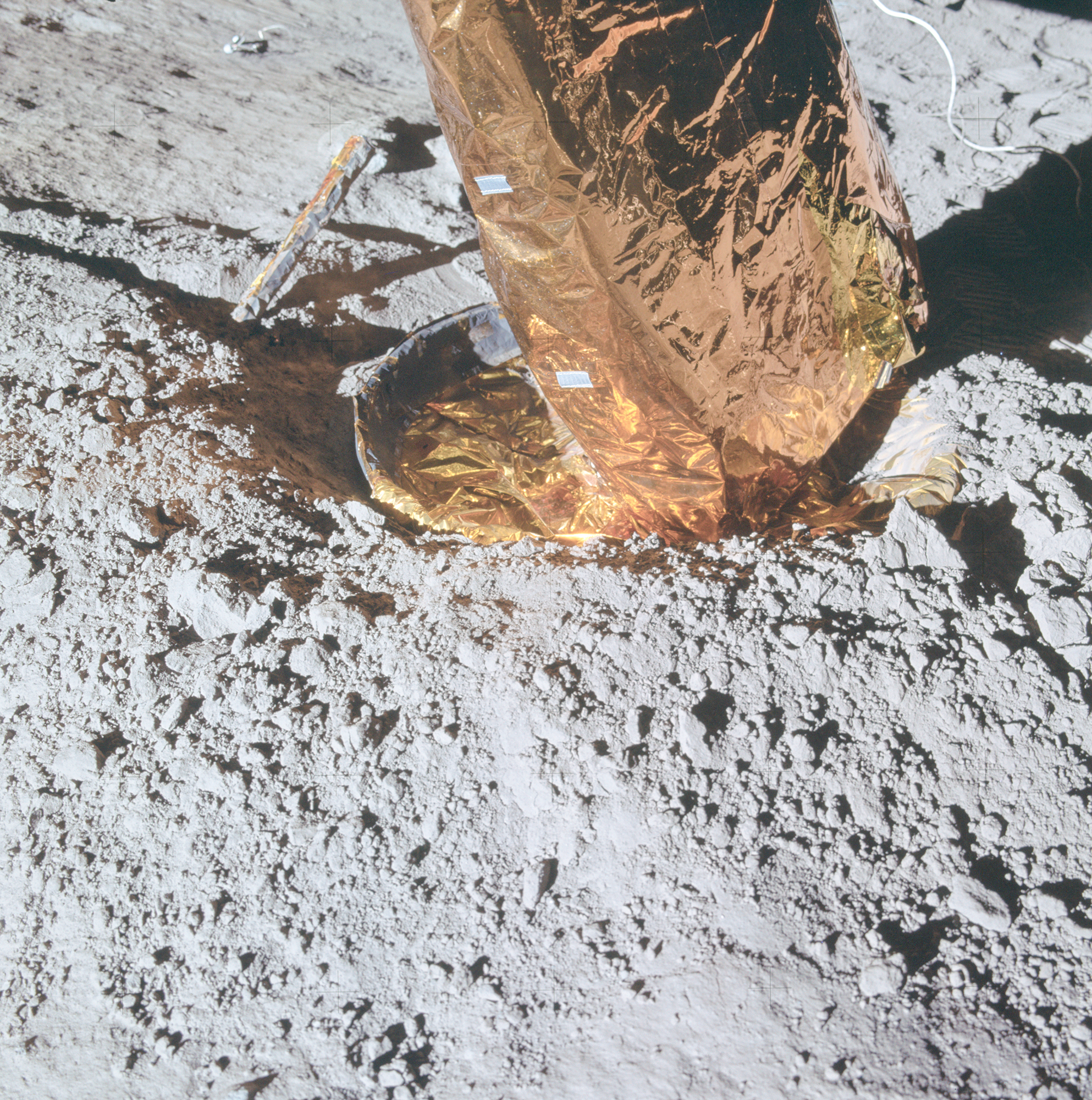 apollo-14-shows-the-north-footpad-which-has-dug-into-the-surface-of-moon.jpg