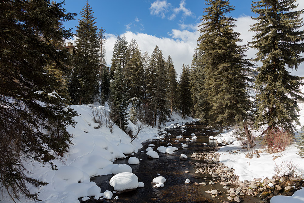 snow-covered-creek-near-ski-area-vail-colorado.jpg