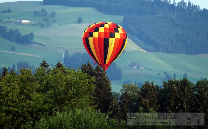 hot-air-balloon-switerland-over-green-hills-1230A.jpg