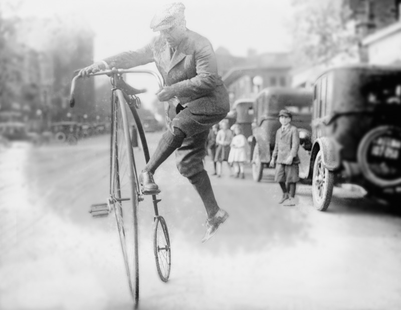 historic photo man riding large bicycle 2.jpg