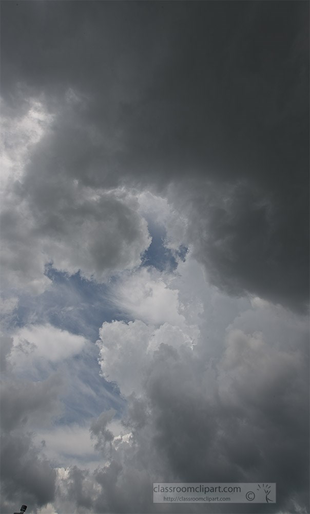 blue-sky-with-light-dard-cumulus-clouds.jpg