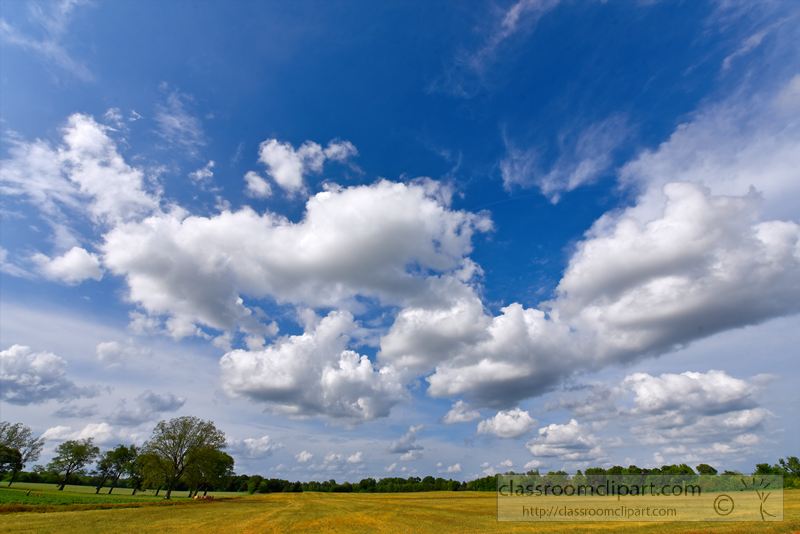 cummulus-clouds-over-agricultural-land-photo-image-1501A.jpg