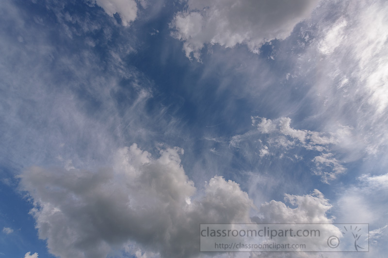 puffy-cumulus-clouds-set-against-wispy-cirrus-cloud-4474.jpg