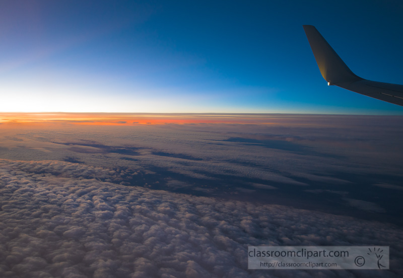 view-of-stratocumulus-clouds-sun-rising-from-commercial-aircraft-photo-8501712.jpg