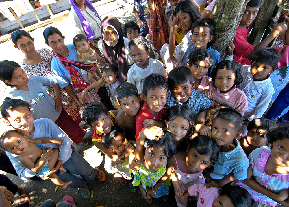 children-smile-and-gather-for-a-group-photo-sumatra.jpg